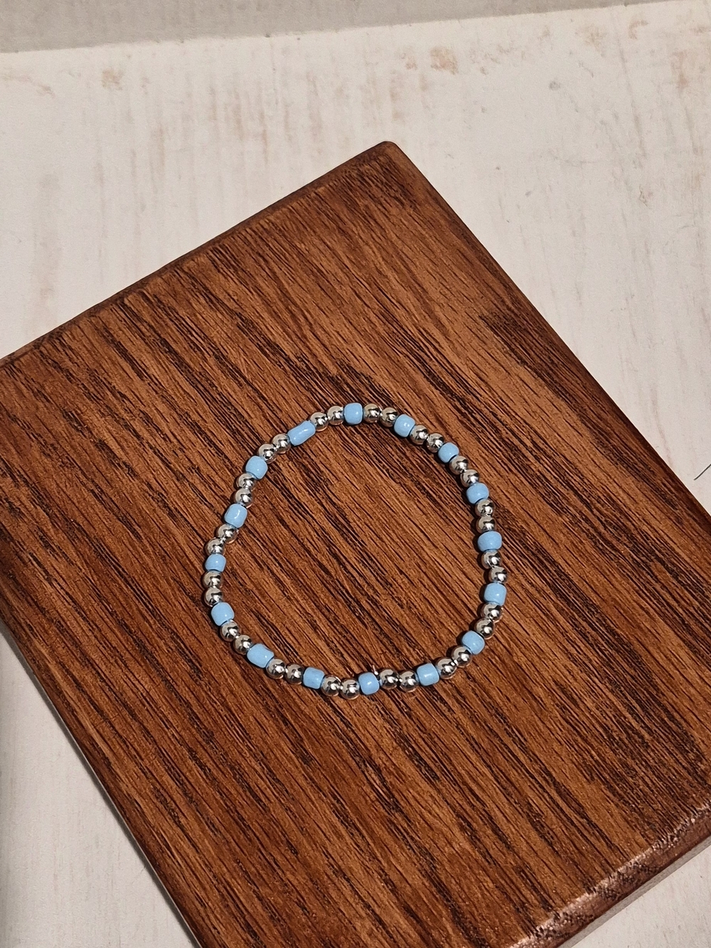 Light Blue Beaded Stretch Bracelet with Silver Accents
